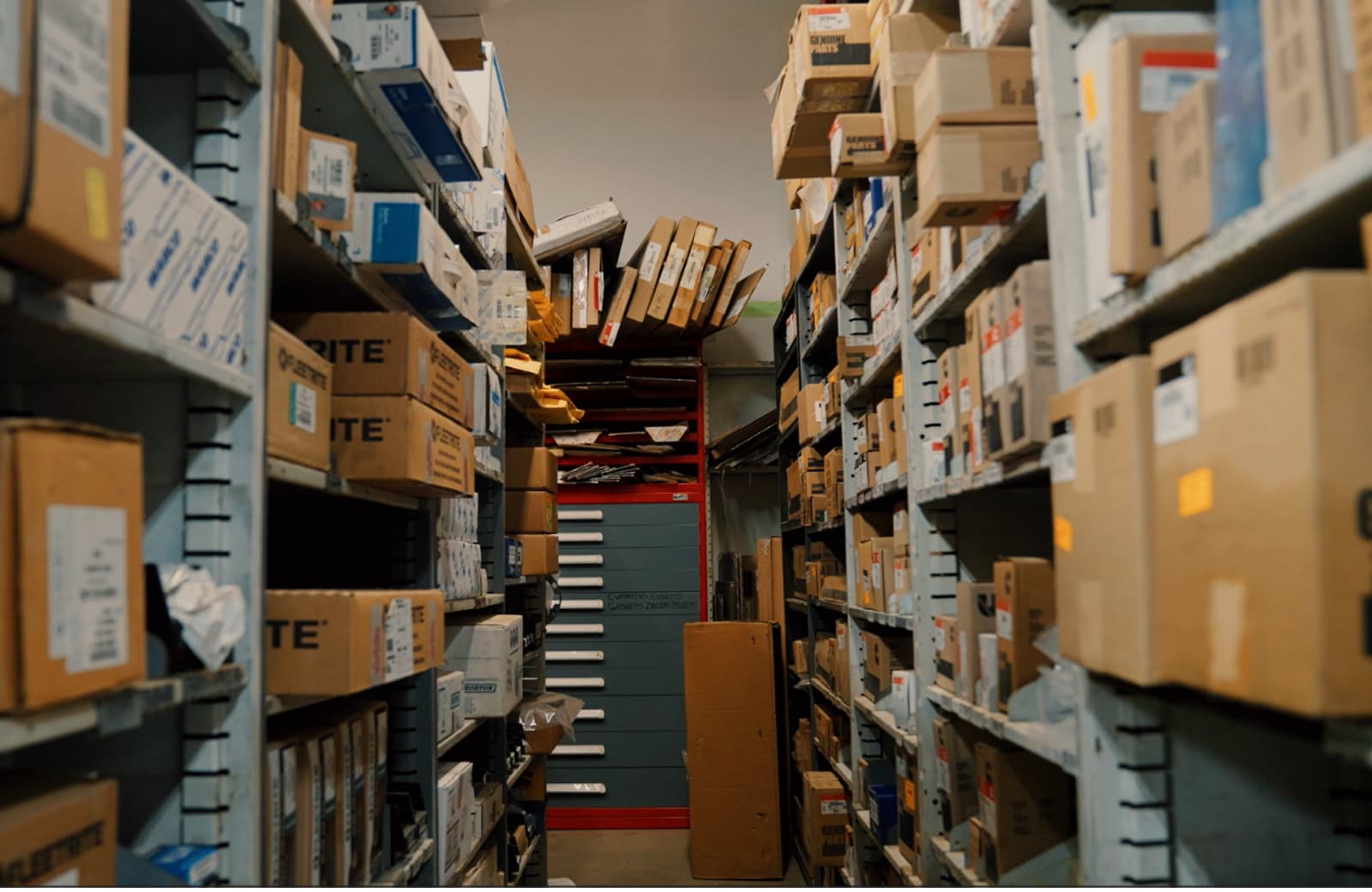 Boxes on shelves in a corridor