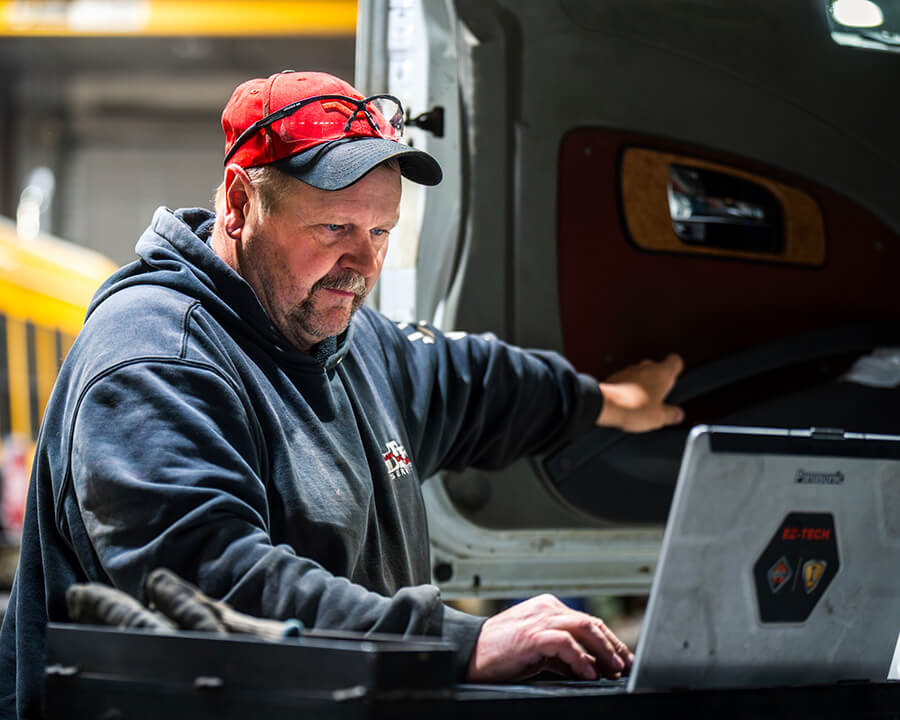 Mechanic Repairing a Truck